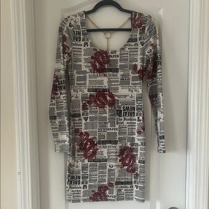 Unique Newspaper Print Dress with Dragon Accents